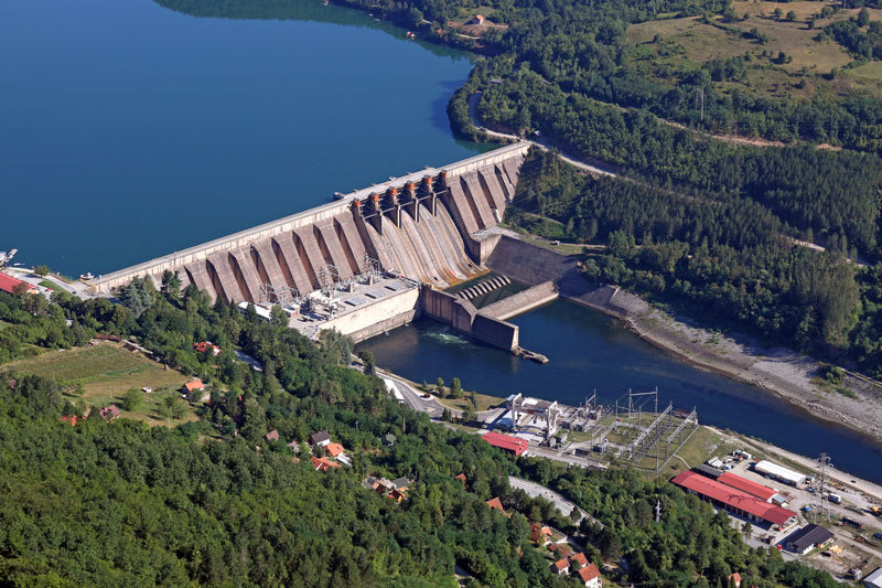 Aerial photo of hydroelectric electric dam on sunny summer day
