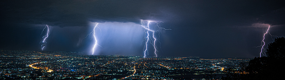 lightening storm over city at night
