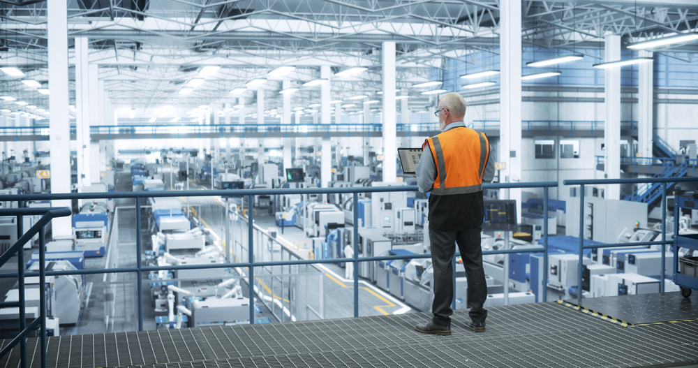 Plant managers reviewing energy data to reduce carbon emissions